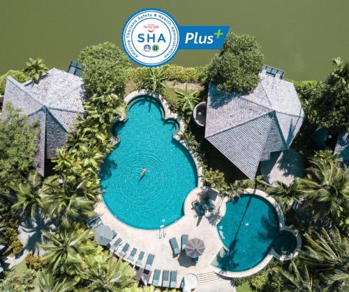 an overhead view of a pool at a resort at Peace Laguna Resort & Spa in Ao Nang Beach