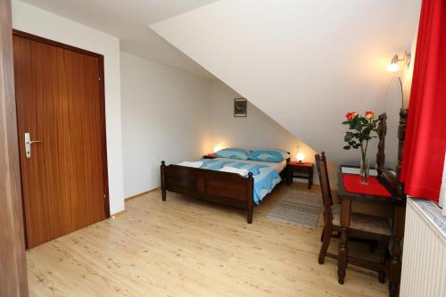 Ένα ή περισσότερα κρεβάτια σε δωμάτιο στο Bed & Breakfast Hisa Resje