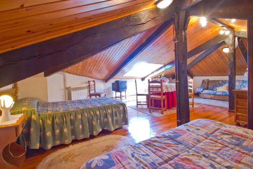 A bed or beds in a room at Hospedaje Roiz