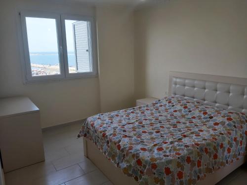 Postel nebo postele na pokoji v ubytování Shengjin-mi casa es tu casa