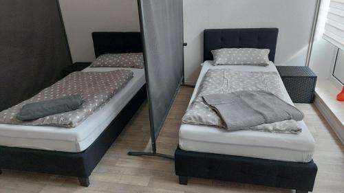 Cama ou camas em um quarto em Monteurzimmer in Neustadt-Glewe