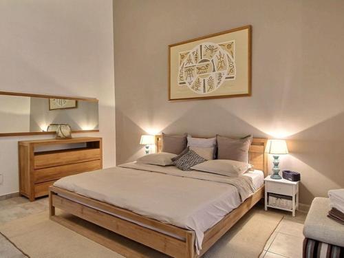 Ένα ή περισσότερα κρεβάτια σε δωμάτιο στο Eden Sea Villa