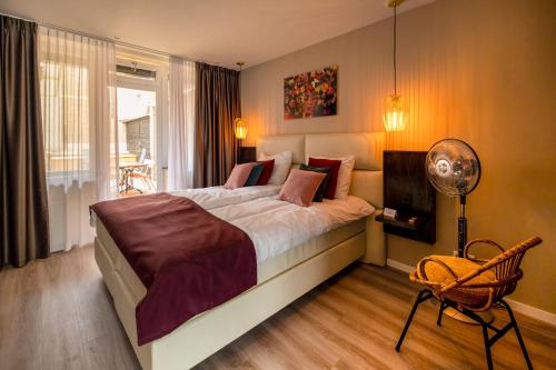 Ein Bett oder Betten in einem Zimmer der Unterkunft Anna van Chiel