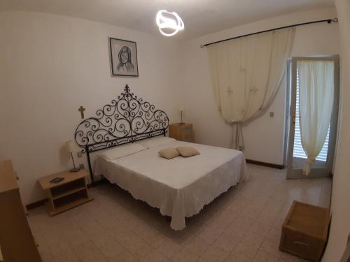 Postel nebo postele na pokoji v ubytování Casa Gori