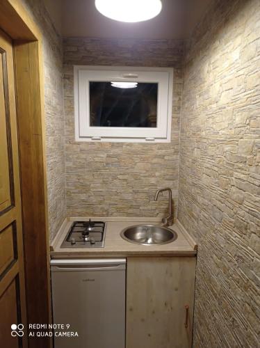 Kuchyň nebo kuchyňský kout v ubytování B&B Le Carrube