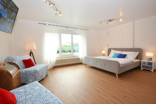 Postel nebo postele na pokoji v ubytování Alpenblick - modernes und großzügiges Apartment