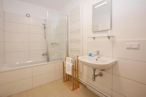 Koupelna v ubytování Alpenblick - modernes und großzügiges Apartment