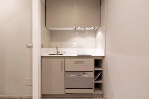 Kuchyň nebo kuchyňský kout v ubytování Contempora Apartments - Elvezia 8 - E31