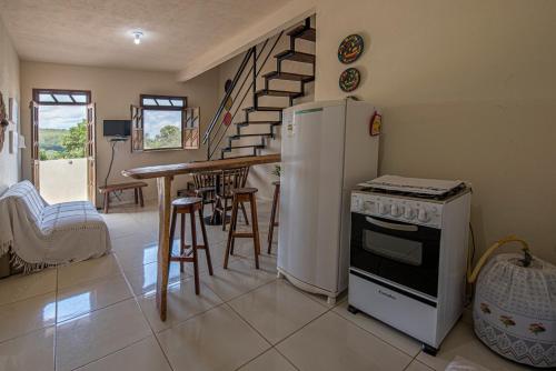 Η κουζίνα ή μικρή κουζίνα στο Village Funchal, Lençóis