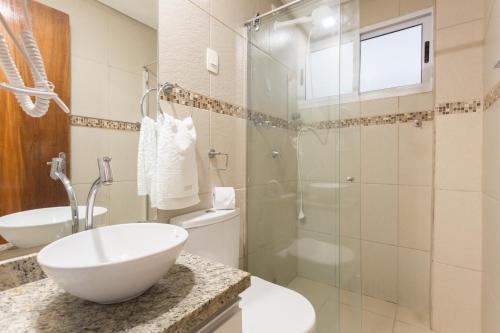Ванная комната в Condomínio Belas Praias