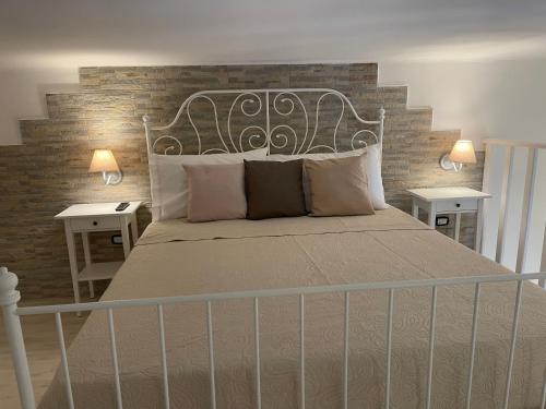 Postel nebo postele na pokoji v ubytování Relais Medea