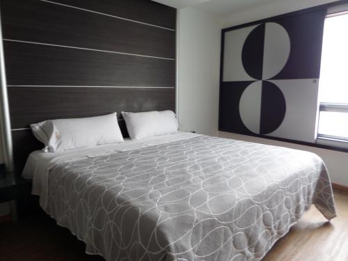 Кровать или кровати в номере Novo Coapa