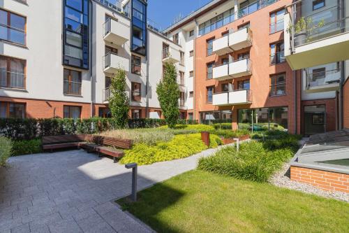 Apartments Harmonica Trynitarska by Noclegi Renters