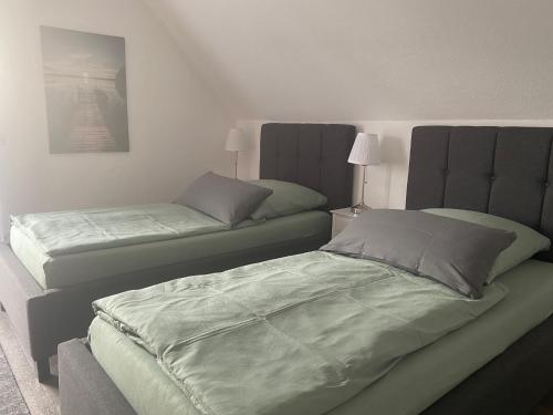 Ένα ή περισσότερα κρεβάτια σε δωμάτιο στο Apartments-Bocholt