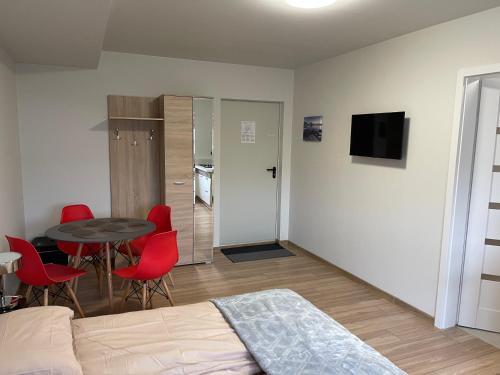 Uma TV ou centro de entretenimento em Helgrindur Guesthouse