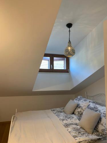 Postel nebo postele na pokoji v ubytování Apartman Mujo