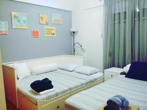 Posteľ alebo postele v izbe v ubytovaní Larisa, Park view apartment