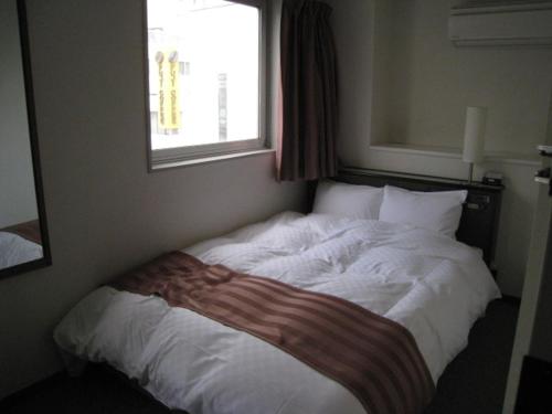 Krevet ili kreveti u jedinici u objektu Hotel Astir Nagoya Sakae