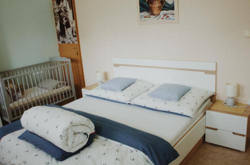 Postel nebo postele na pokoji v ubytování Apartmán "Pod Rokem"