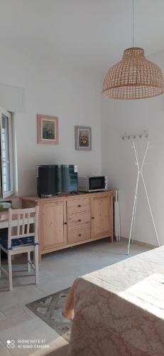 Μια τηλεόραση ή/και κέντρο ψυχαγωγίας στο Villa Francesca Appartamento Ciao Ciao Bambina