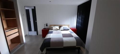 Katil atau katil-katil dalam bilik di Chez Nave au pied du Meygal