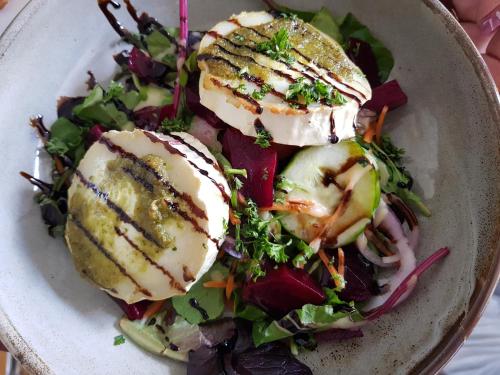 a plate of food with a salad on it at Abbey Hotel in Ballyvourney