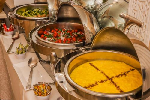 a bunch of food in a pot on a table at Riad Palais Des Princesses & Spa in Marrakesh