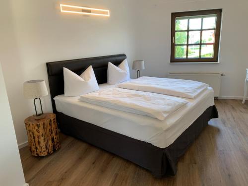 Tempat tidur dalam kamar di Spreezeit Hotel connect