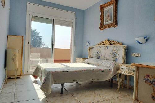Säng eller sängar i ett rum på VILLA Santa Susanna