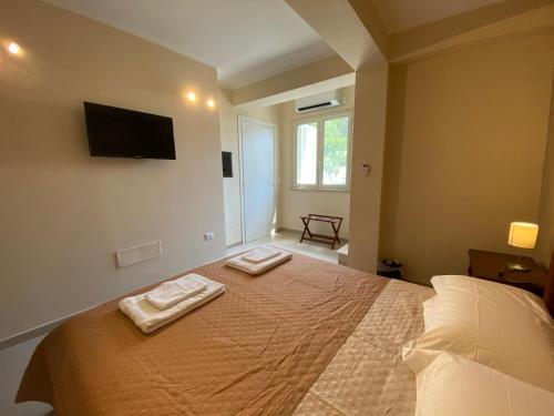 Ліжко або ліжка в номері ISCA BLUE BEACH Casa in Villa con ampio spazio esterno vicino al mare, sino a max 8 persone