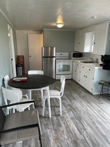 A kitchen or kitchenette at Cottages On PEI