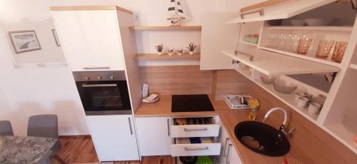 מטבח או מטבחון ב-Apartman ALEM Bihac