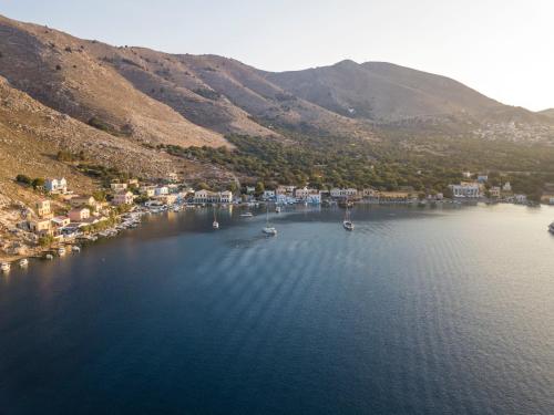 an aerial view of a lake with boats in the water at Villa Sylvia in Symi
