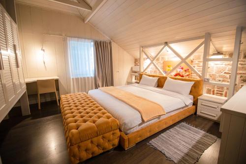 Ένα ή περισσότερα κρεβάτια σε δωμάτιο στο Meri Boutique Hotel