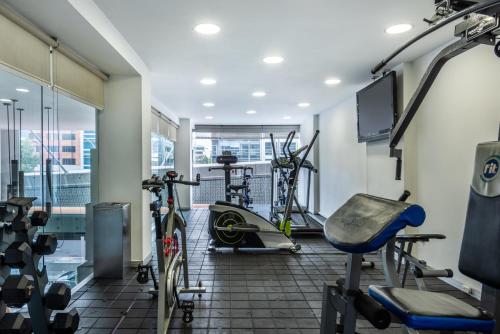 a fitness room with bikes and a gym at SHG Bogotá 100 Design Hotel in Bogotá