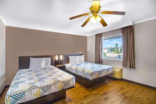 En eller flere senge i et værelse på Motel 6-Front Royal, VA