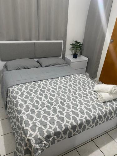 Cama o camas de una habitación en San Juan Apartments