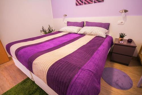 Llit o llits en una habitació de Apartments Lavanda & Cappuccino