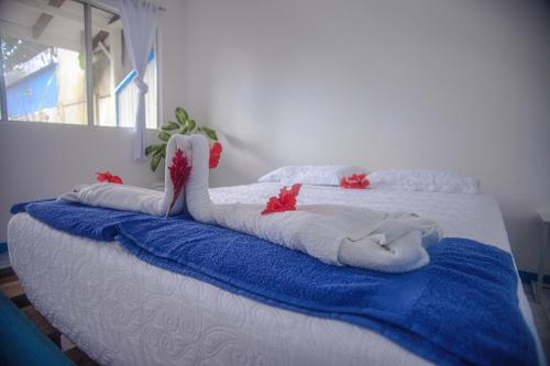 Ein Bett oder Betten in einem Zimmer der Unterkunft Hotel W Exotic