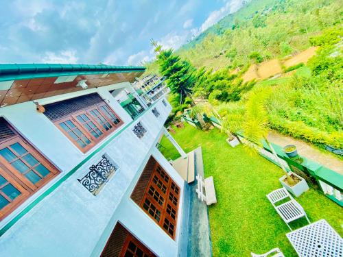 an aerial view of a house with a yard at Srilak View Holiday Inn in Haputale