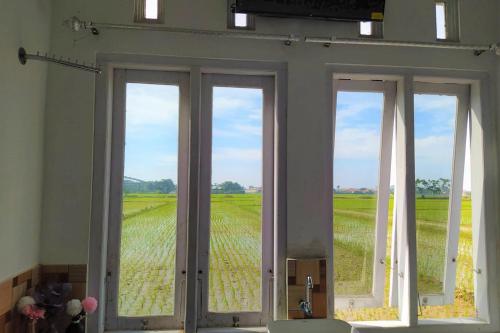 Imagen de la galería de Guesthouse Berlian Batang Syariah near Kampung Kalisalak Park, en Pekalongan