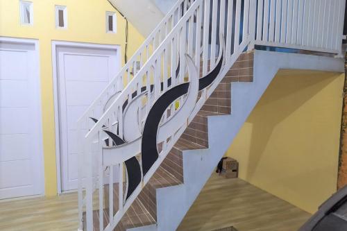 Imagen de la galería de Guesthouse Berlian Batang Syariah near Kampung Kalisalak Park, en Pekalongan