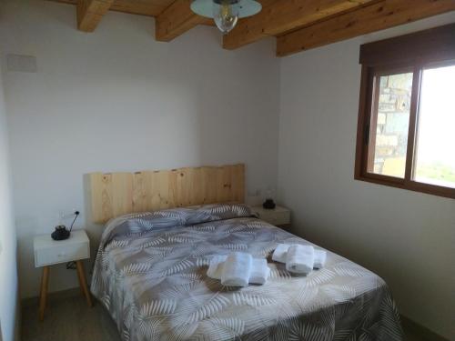Postel nebo postele na pokoji v ubytování Casa Rural Chuan Murillo