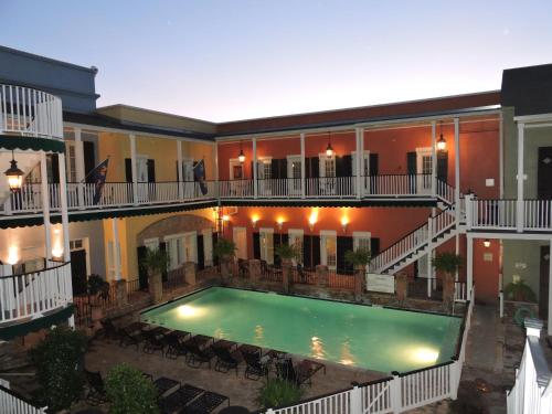 an empty pool in the middle of a building at French Quarter Courtyard Hotel and Suites in New Orleans