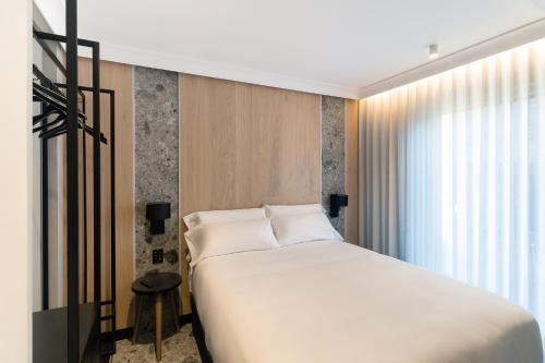 Katil atau katil-katil dalam bilik di Mauro Suites