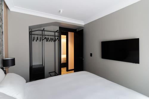 Katil atau katil-katil dalam bilik di Mauro Suites