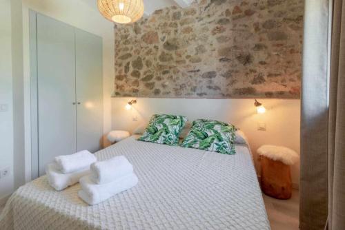 Lova arba lovos apgyvendinimo įstaigoje OCELLS DE MONTGRÍ apartamento rural en el Baix Empordà