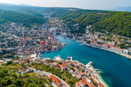 an aerial view of a town next to a river at Apartments Sonja in Pučišća