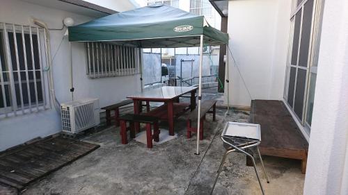 Ein Patio oder anderer Außenbereich in der Unterkunft 民宿 ＯＢ（guest house OB）