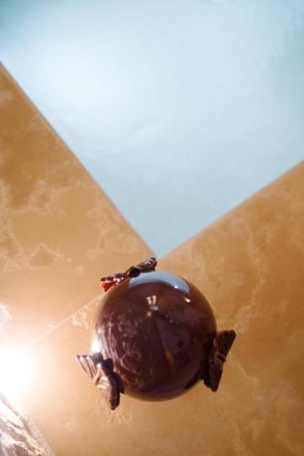 a watch sitting on top of a table at Casa Sotto l'Arco in Ceglie Messapica